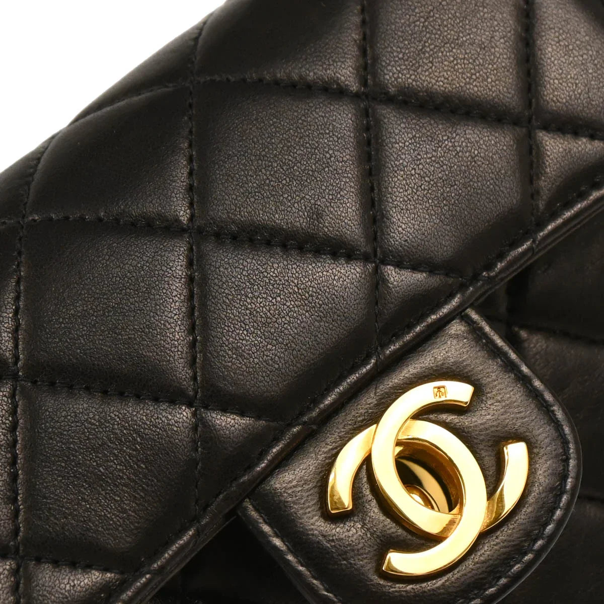 Chanel 1991-1994 Black Lambskin Micro Classic Flap Handbag