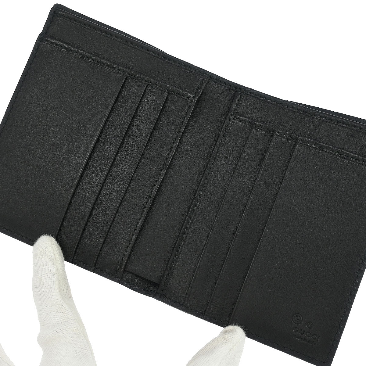 Gucci Black Leather Guccissima Bifold Wallet