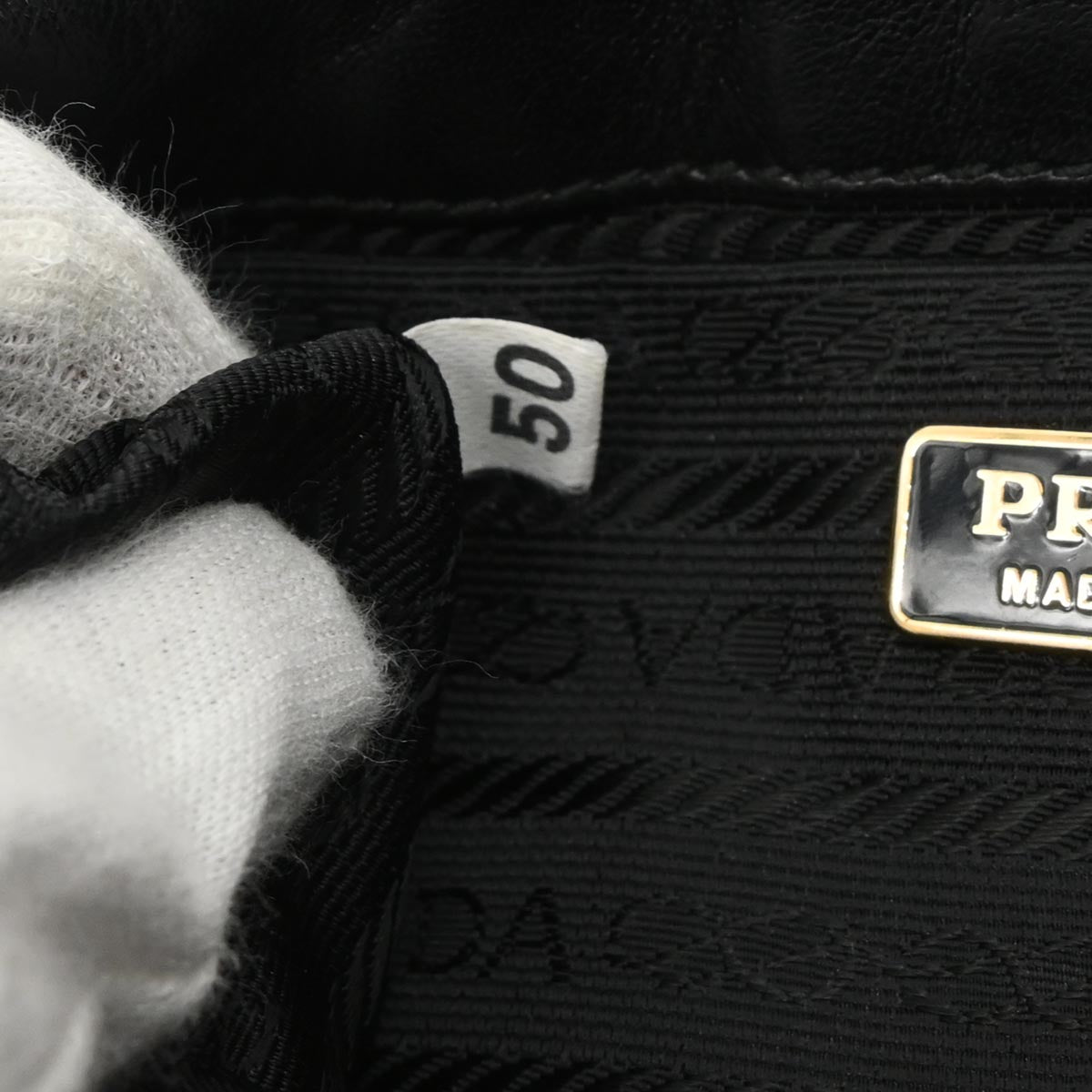 Prada Black Leather Metal Grommet Handbag