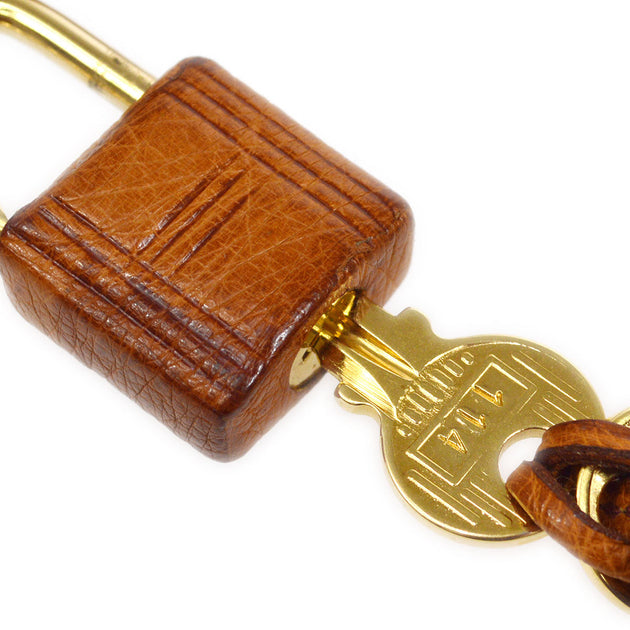 HERMES * Kelly bag strap & padlock set Brown Ostrich – AMORE