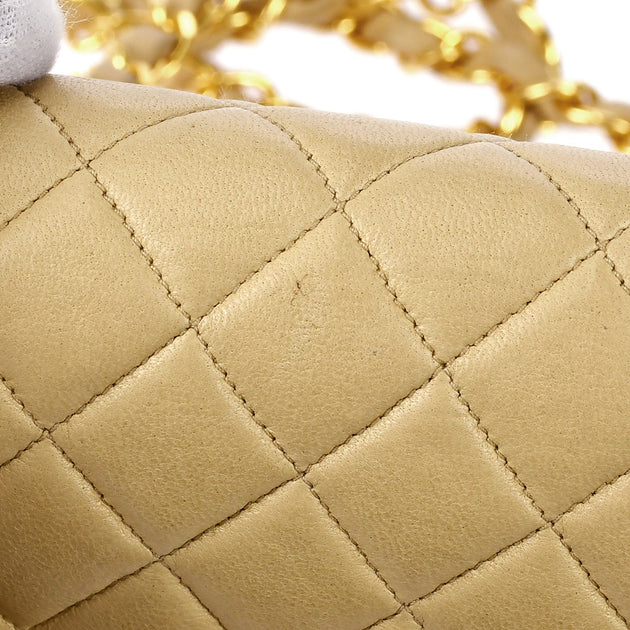 Chanel 1991-1994 Classic Flap Handbag Gold Lambskin – AMORE Vintage Tokyo