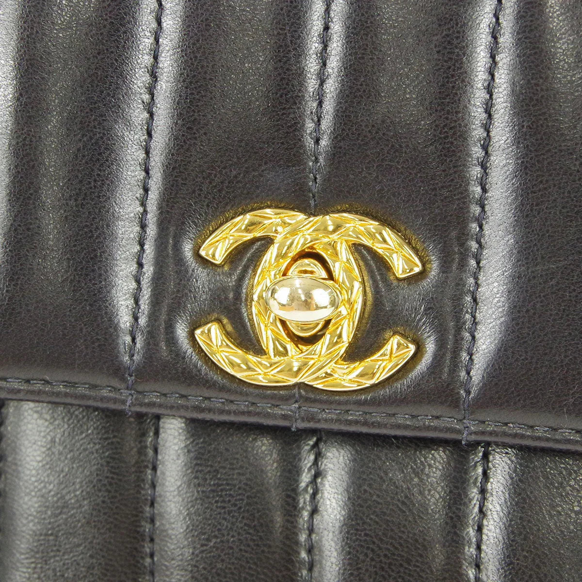 Chanel * 1991-1994 Black Lambskin Mini Vertical Stitch Flap Bag
