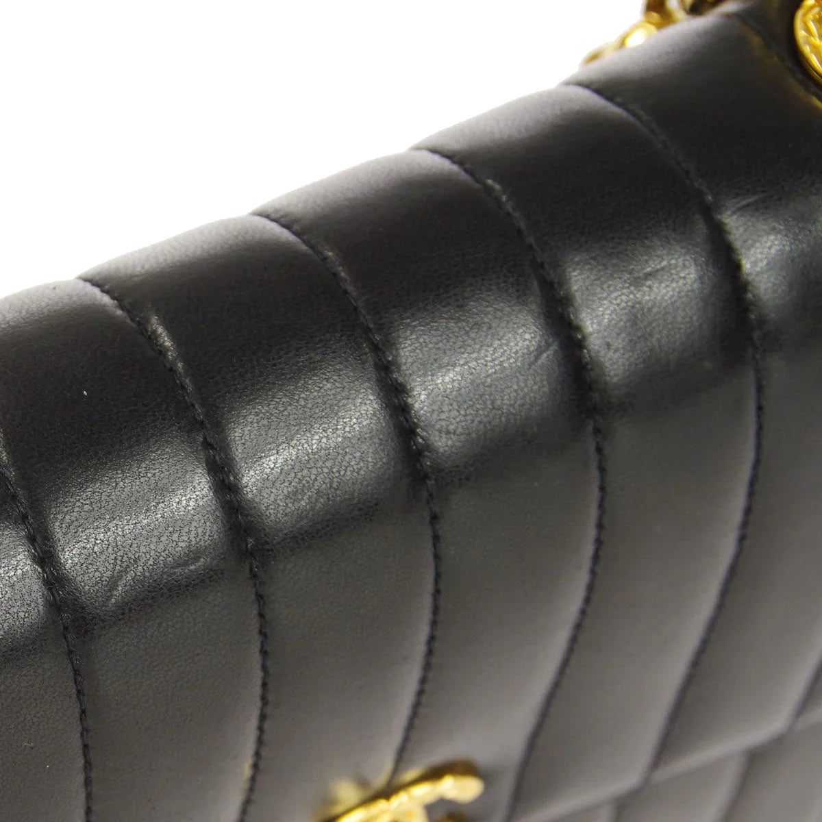 Chanel * 1991-1994 Black Lambskin Mini Vertical Stitch Flap Bag