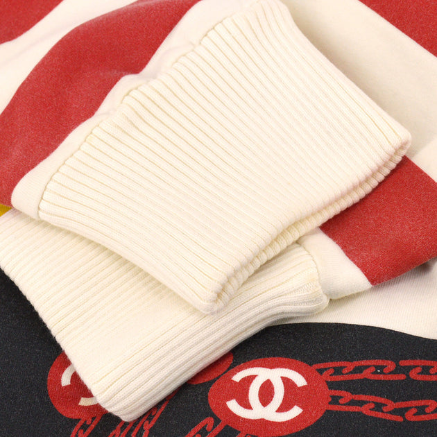 White chanel sweater shop with red logo