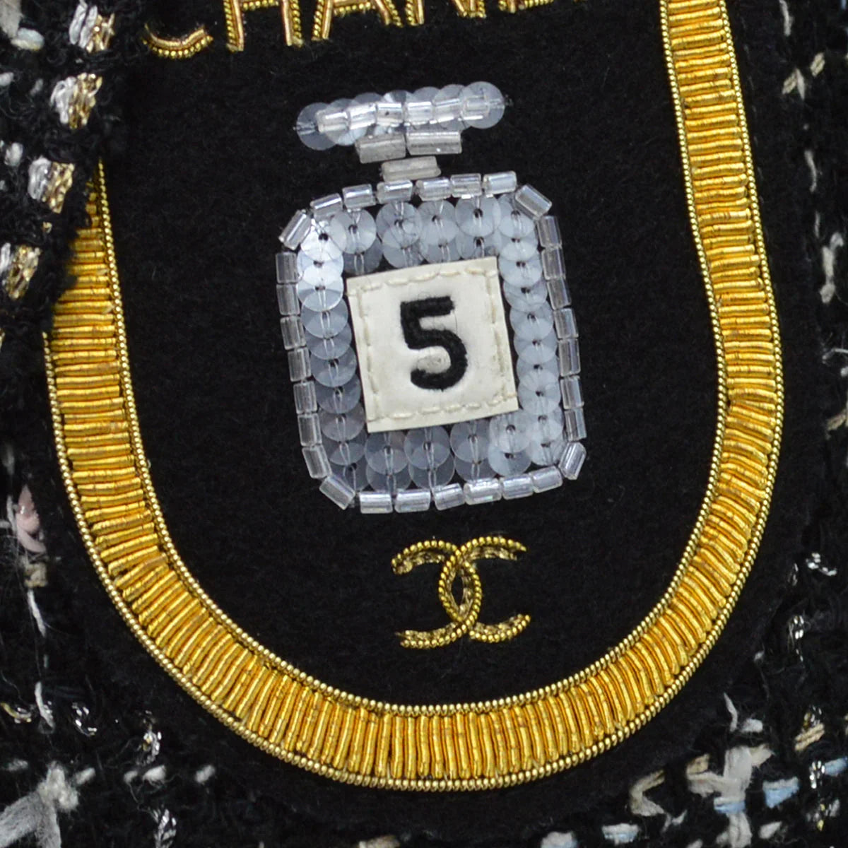 Chanel 2005 cruise crest-applique tweed coat #40