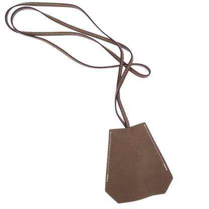 Hermes Etoupe Gray Swift Clochette Necklace Pendant