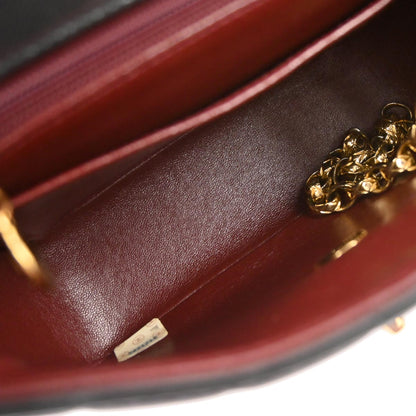 Chanel 1991-1994 Black Lambskin Mademoiselle Shoulder Bag