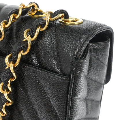 Chanel 1991-1994 Black Caviar Skin Chevron Maxi Classic Flap Shoulder Bag