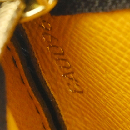 Louis Vuitton Monogram Groom Pochette Cles Coin Case M60033