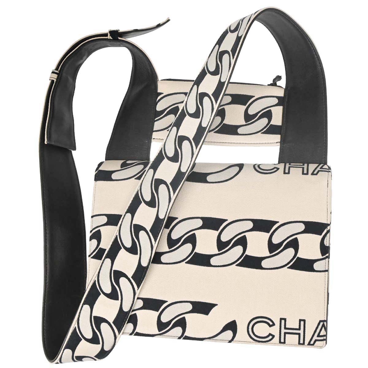 Chanel 2002-2003 Beige Black Canvas Graphic Logo Mademoiselle Lock Shoulder Bag