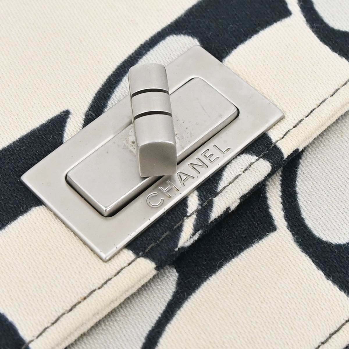 Chanel 2002-2003 Beige Black Canvas Graphic Logo Mademoiselle Lock Shoulder Bag