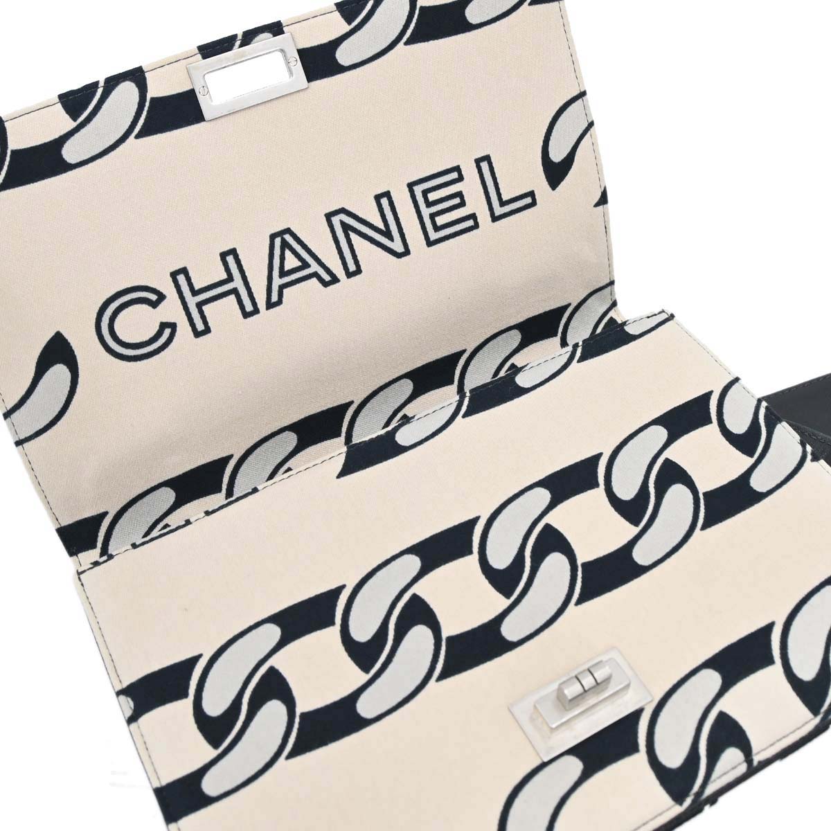 Chanel 2002-2003 Beige Black Canvas Graphic Logo Mademoiselle Lock Shoulder Bag
