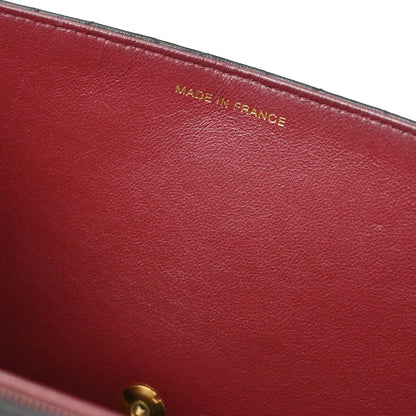 Chanel 1996-1997 Black Lambskin Pushlock Medium Half Flap Shoulder Bag