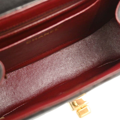 Chanel 1994-1996 Black Lambskin Mademoiselle Lock Handbag