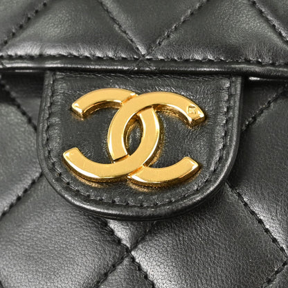 Chanel 1994-1996 Black Lambskin Pushlock Small Half Flap Shoulder Bag