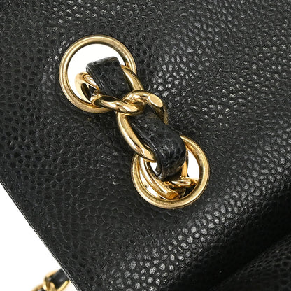 Chanel 2011 Black Caviar Skin Jumbo Classic Double Flap Shoulder Bag