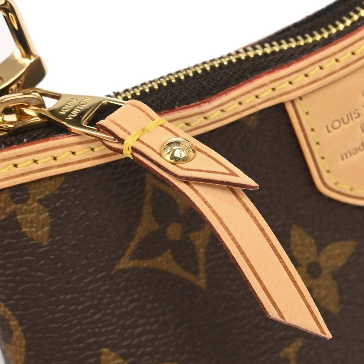 Louis Vuitton 2010 Monogram Mini Pochette Delightful Handbag M40309