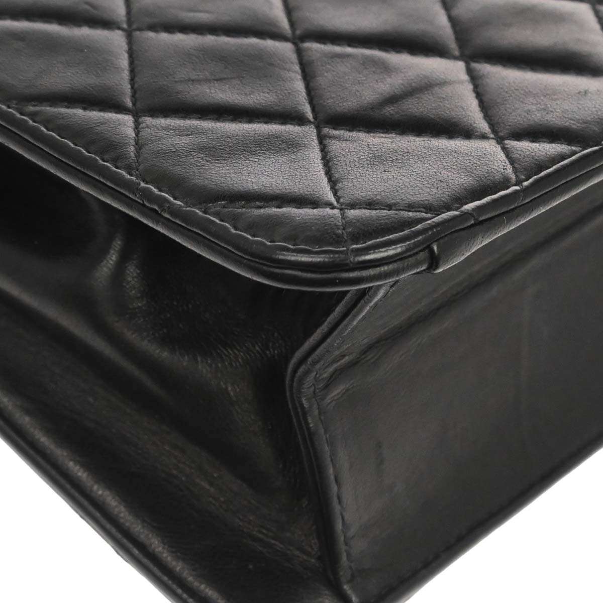 Chanel 1996-1997 Black Lambskin Pushlock Medium Half Flap Shoulder Bag