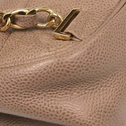 Chanel 1996-1997 Beige Caviar Skin Triple CC Backpack