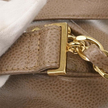 Chanel 1996-1997 Beige Caviar Skin Triple CC Backpack