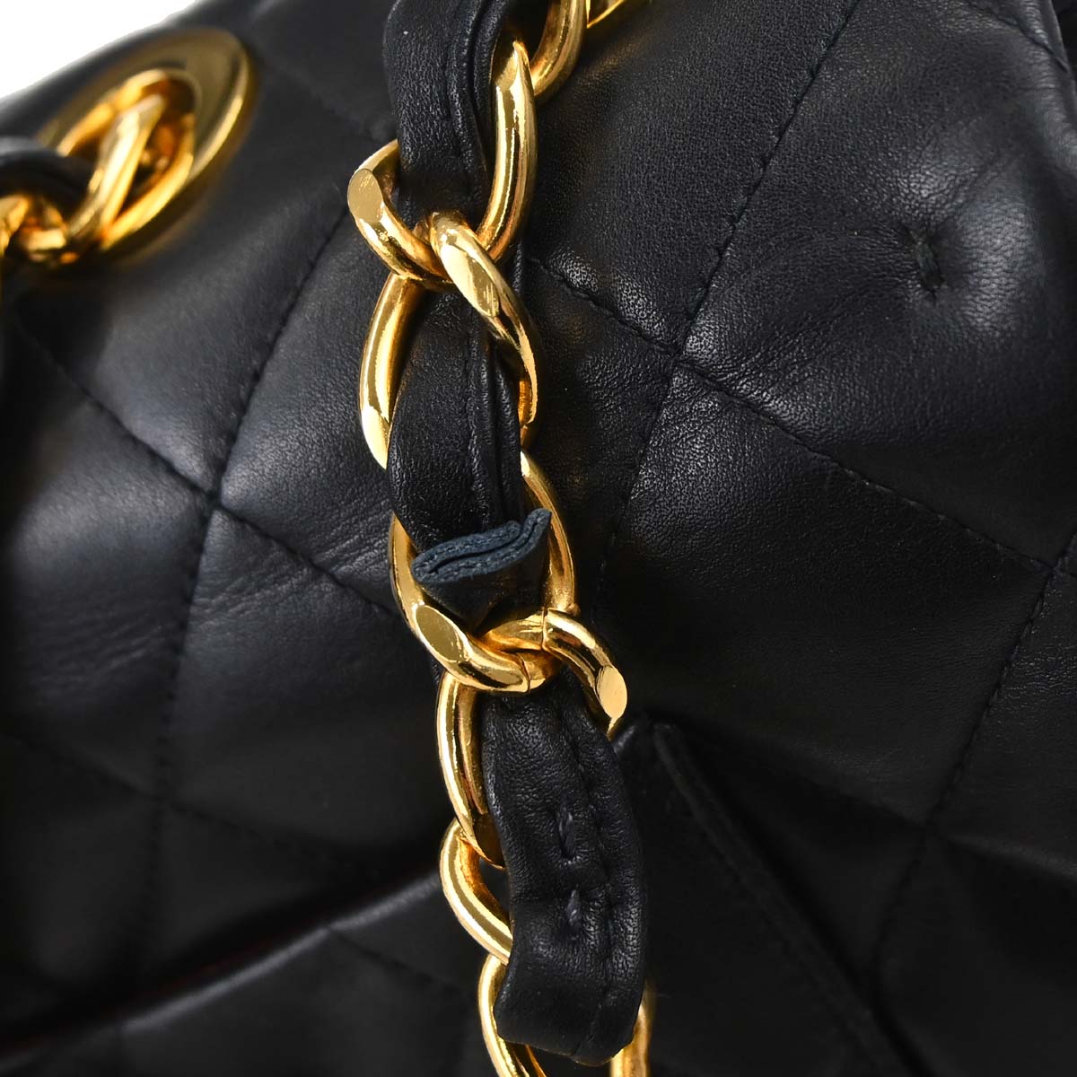 Chanel 1991-1994 Black Lambskin Maxi Classic Flap Shoulder Bag