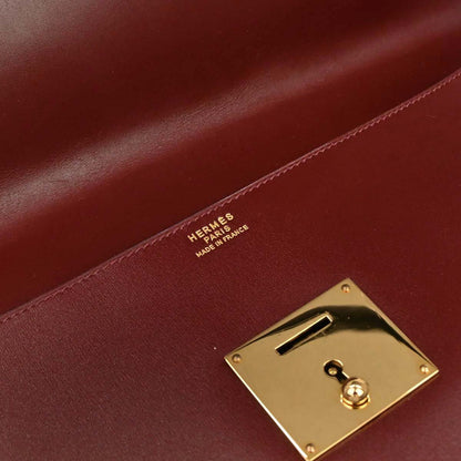 Hermes Rouge H Box Calf Quirus Clutch Bag