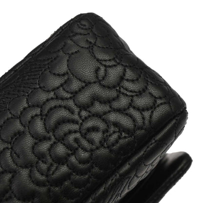 Chanel Black Camellia Embossed Lambskin Medium Classic Double Flap Bag