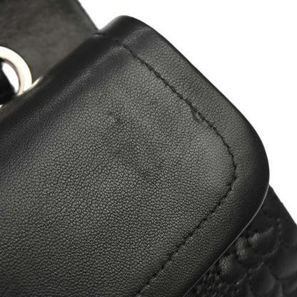 Chanel Black Camellia Embossed Lambskin Medium Classic Double Flap Bag