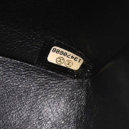 Chanel Black Camellia Embossed Lambskin Medium Classic Double Flap Bag