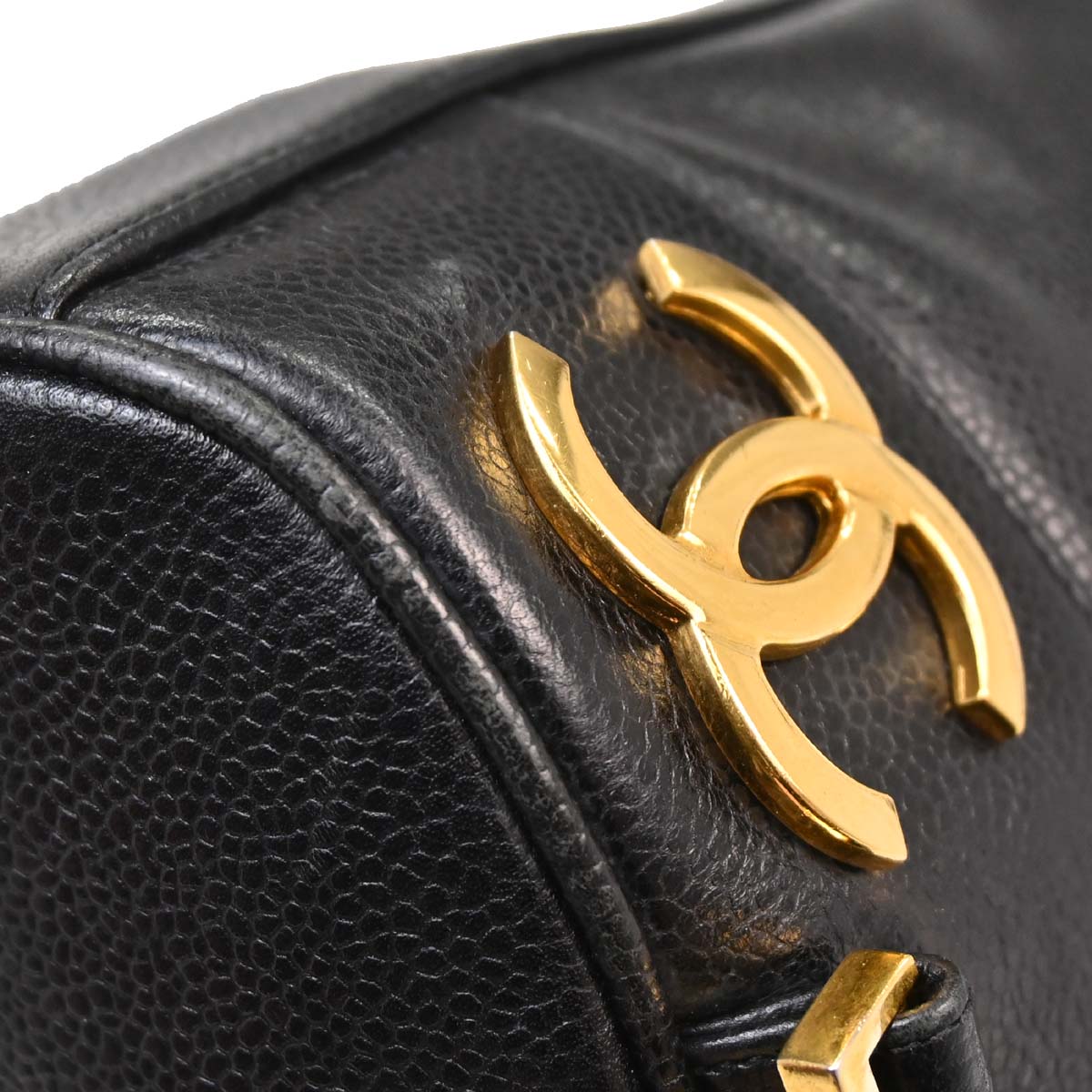 Check Chanel 1991-1994 Black Caviar Skin Triple CC Backpack