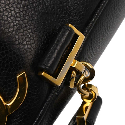 Check Chanel 1991-1994 Black Caviar Skin Triple CC Backpack