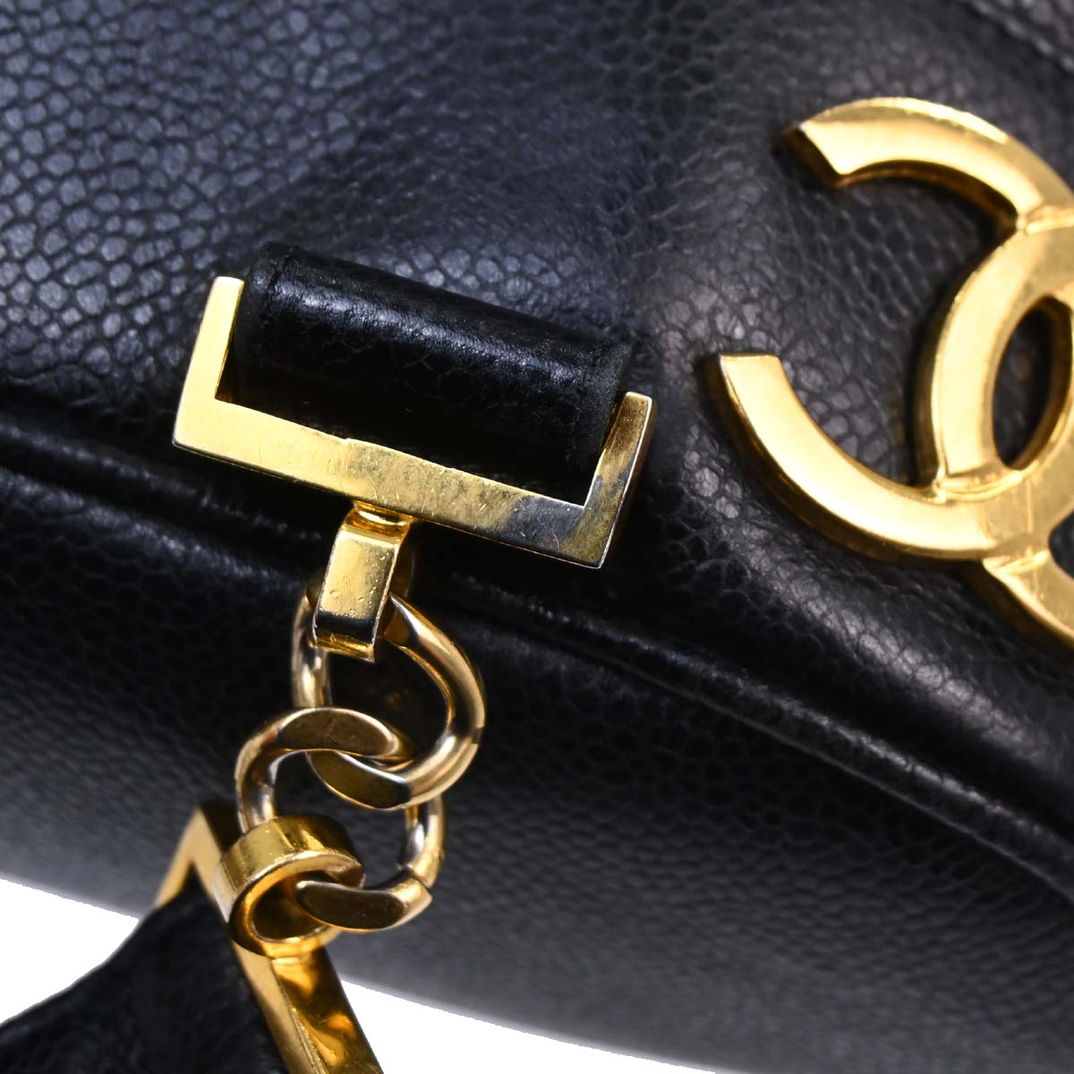 Check Chanel 1991-1994 Black Caviar Skin Triple CC Backpack