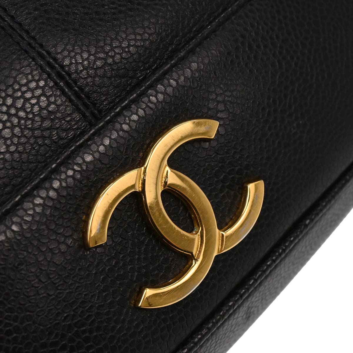 Check Chanel 1991-1994 Black Caviar Skin Triple CC Backpack