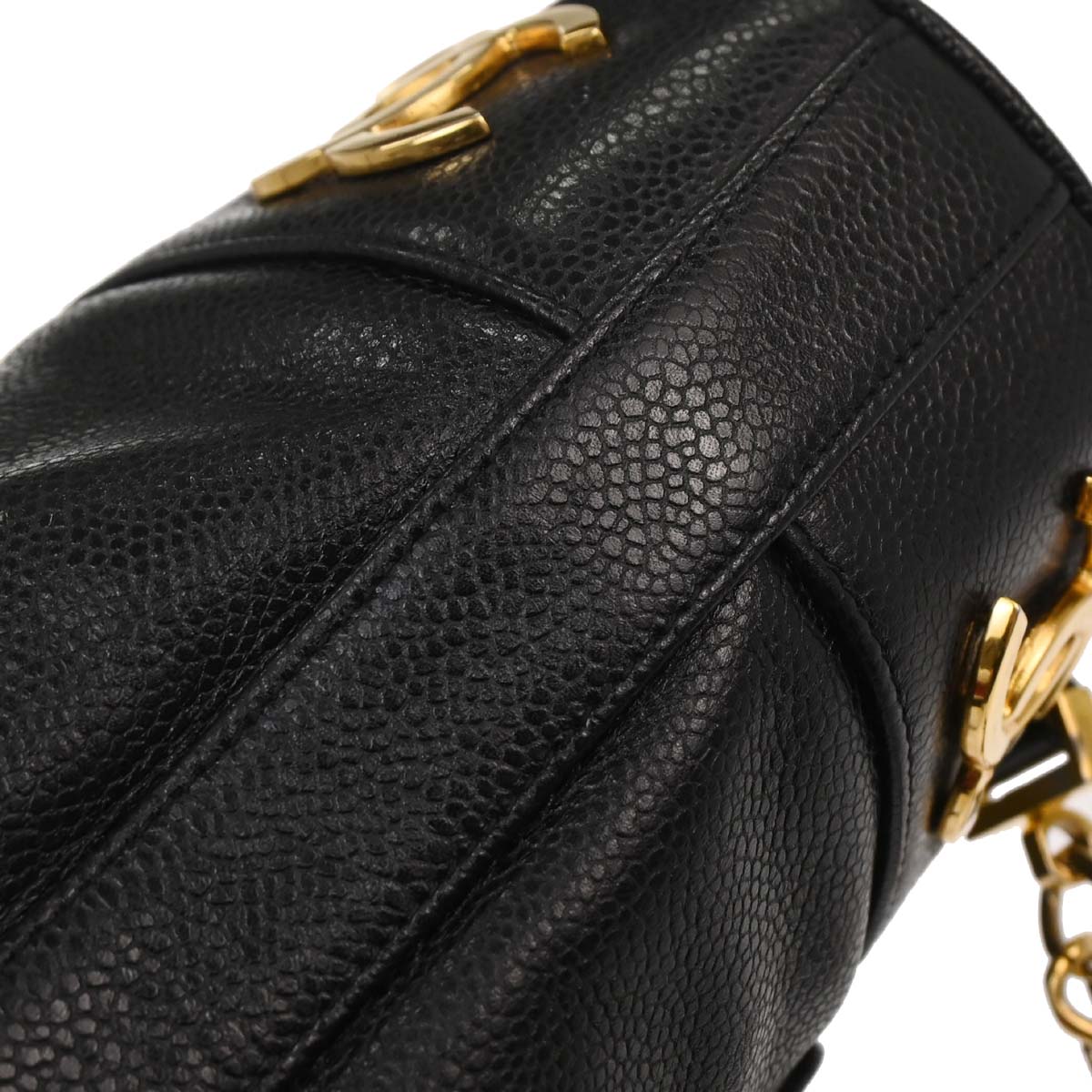 Check Chanel 1991-1994 Black Caviar Skin Triple CC Backpack