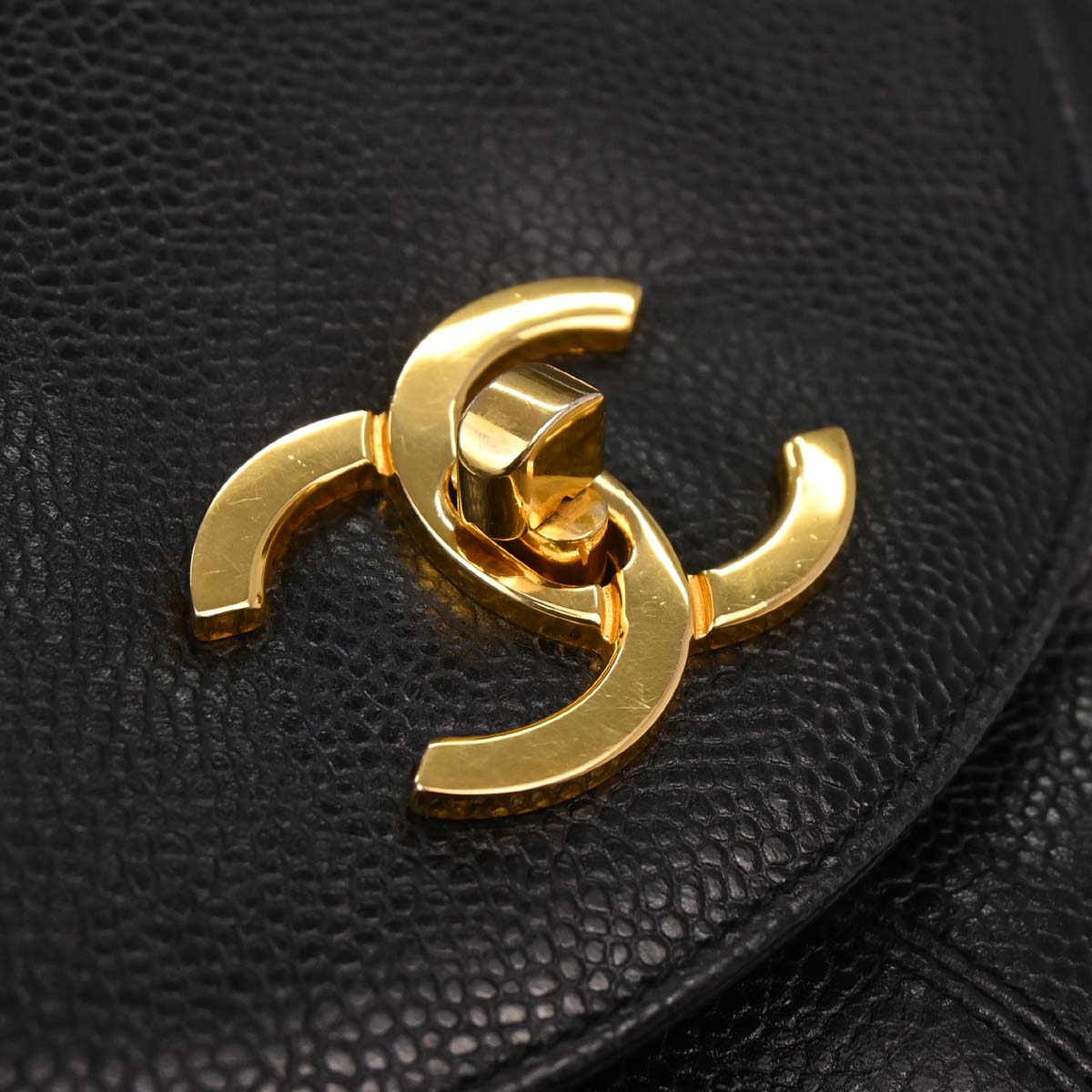 Check Chanel 1991-1994 Black Caviar Skin Triple CC Backpack
