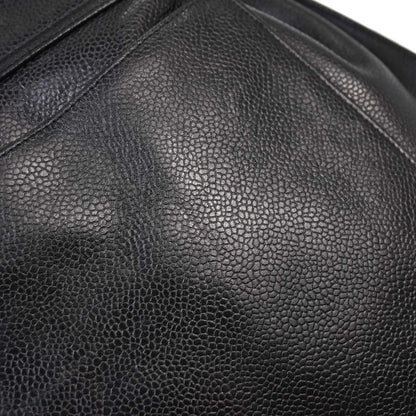 Check Chanel 1991-1994 Black Caviar Skin Triple CC Backpack