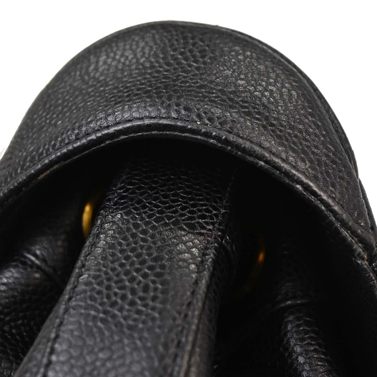Check Chanel 1991-1994 Black Caviar Skin Triple CC Backpack