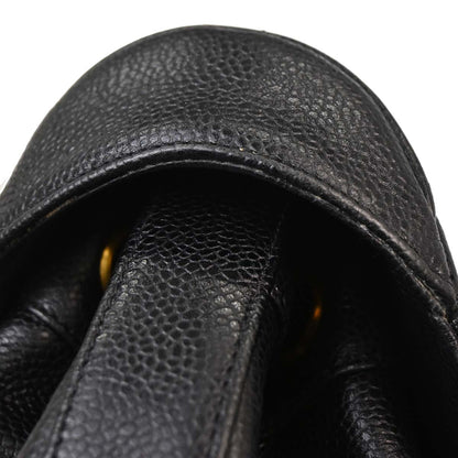 Check Chanel 1991-1994 Black Caviar Skin Triple CC Backpack