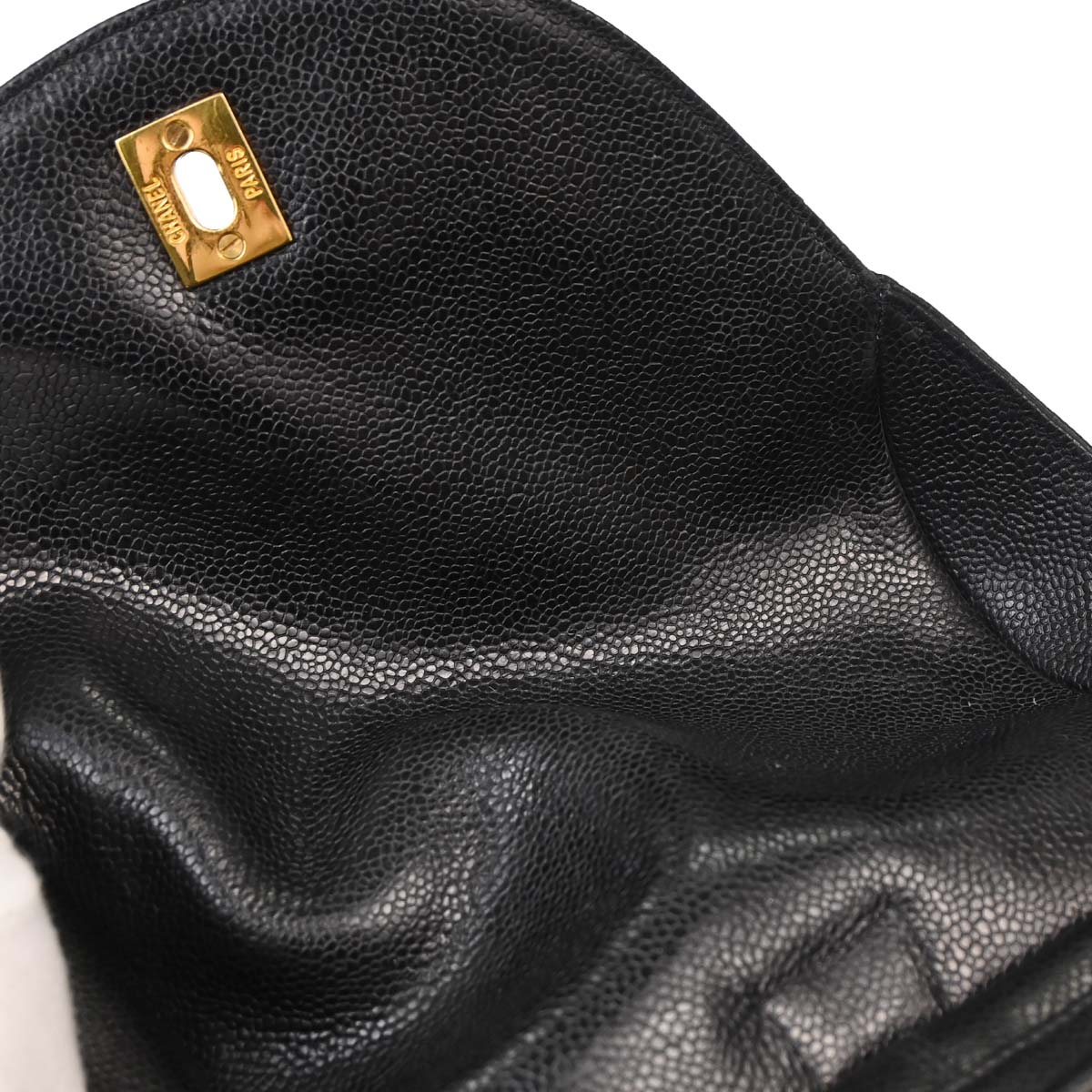 Check Chanel 1991-1994 Black Caviar Skin Triple CC Backpack