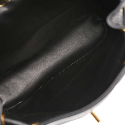 Check Chanel 1991-1994 Black Caviar Skin Triple CC Backpack