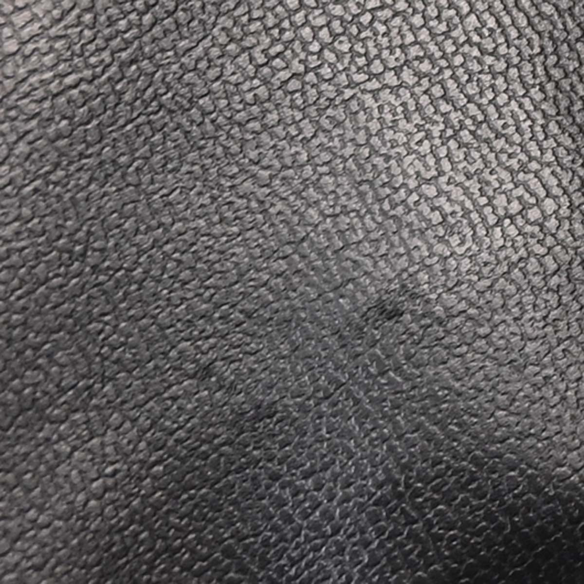 Check Chanel 1991-1994 Black Caviar Skin Triple CC Backpack