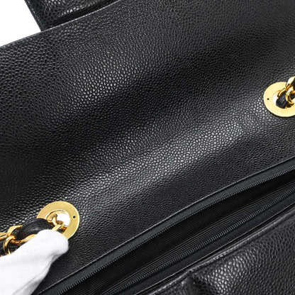 Chanel 1991-1994 Black Caviar Skin Jumbo Mademoiselle Classic Flap Bag