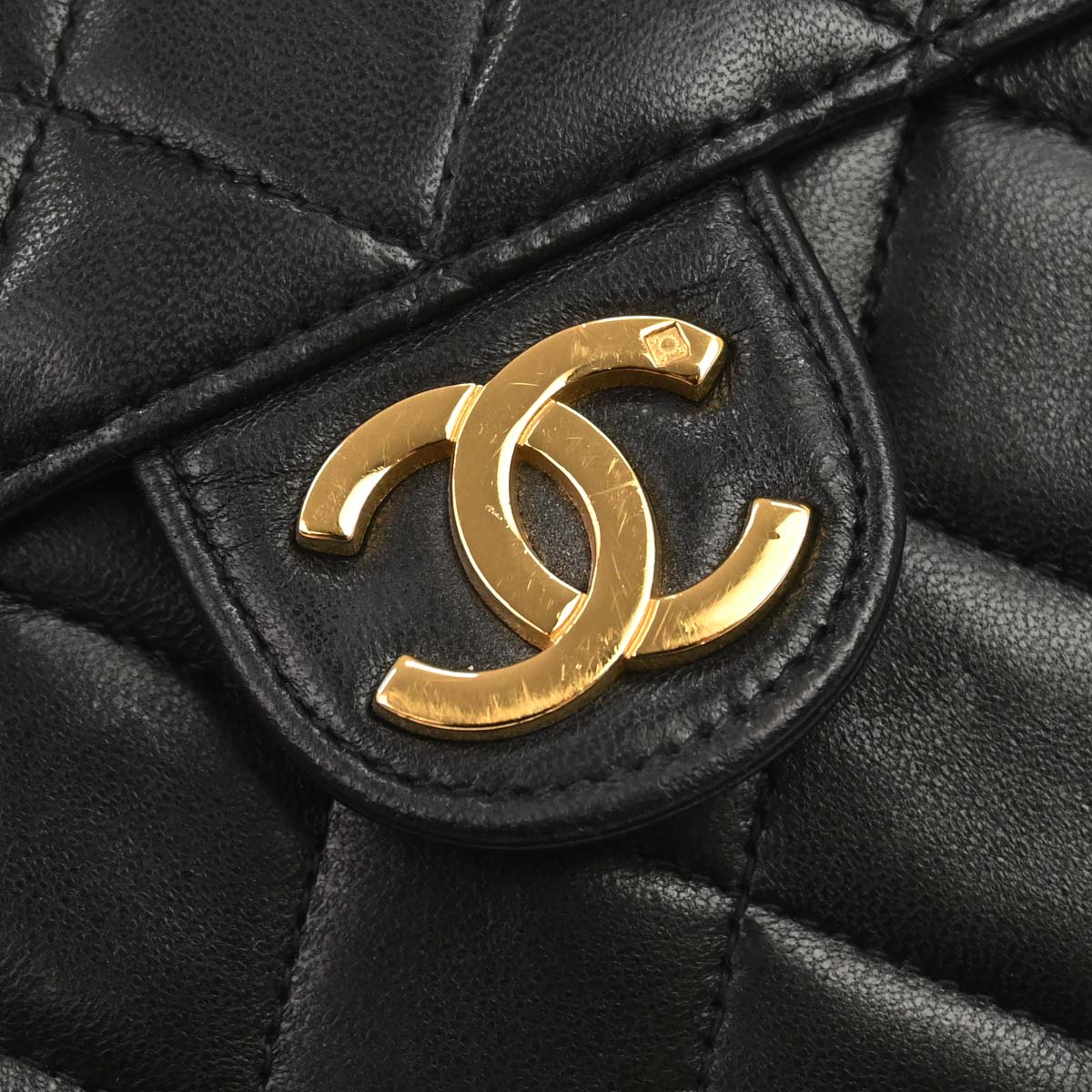 Chanel 1996-1997 Black Lambskin Pushlock Medium Half Flap Shoulder Bag