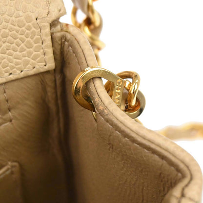 Chanel 1994-1996 Beige Caviar Skin Small Diana Shoulder Bag