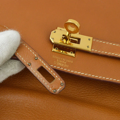 Hermes 1991 Gold Gulliver Kelly 20 Retourne