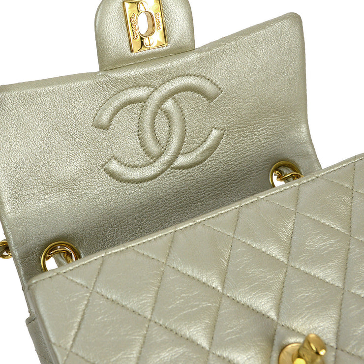 Chanel 1991-1994 Champagne Gold Lambskin Mini Classic Square Flap Shoulder Bag 17