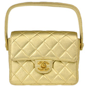 Chanel 1996-1997 Gold Lambskin Mini Handbag