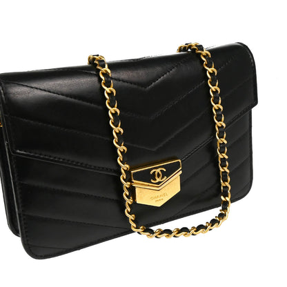 Check Chanel 2018-2019 Black Lambskin Chevron Medal Flap WOC Shoulder Wallet Bag