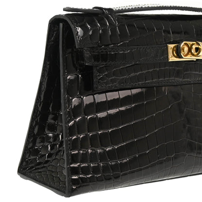 Hermes * 2013 Black Niloticus Pochette Kelly Handbag