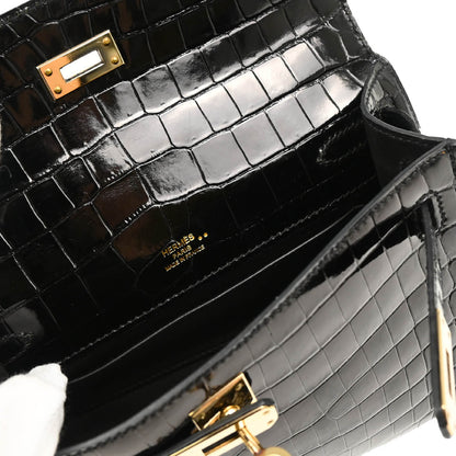 Hermes * 2013 Black Niloticus Pochette Kelly Handbag